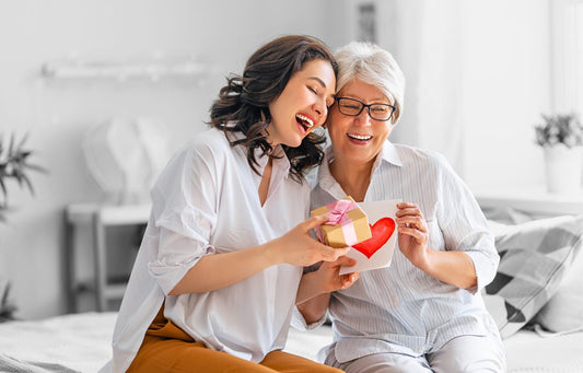 Christian women giving her mother a gift