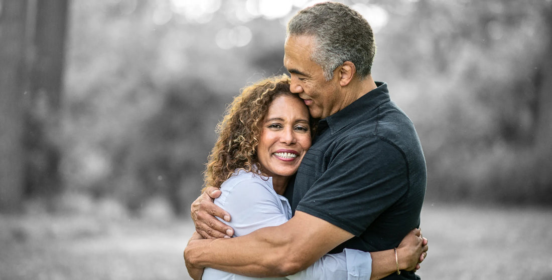 Husband hugging his happy wife