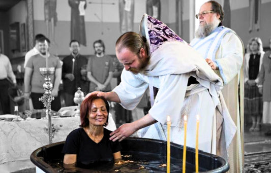 Adult women getting baptised