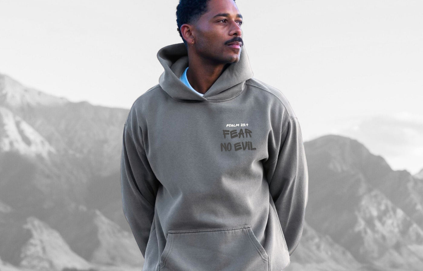 Man wearing a grey Gracefiber hoodie