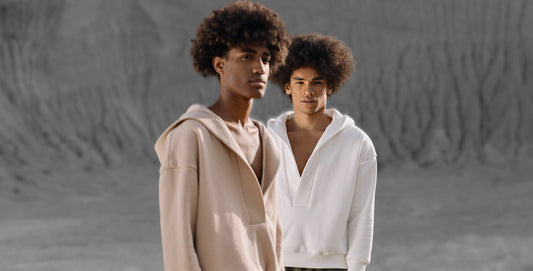 Two male models wearing trendy hoodies