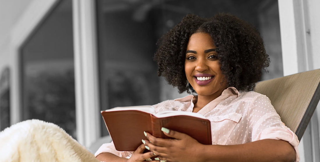 A women studying the bible at home